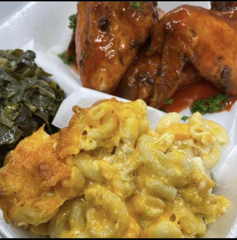 Glazed wings served with Million Dolla Mac and greens